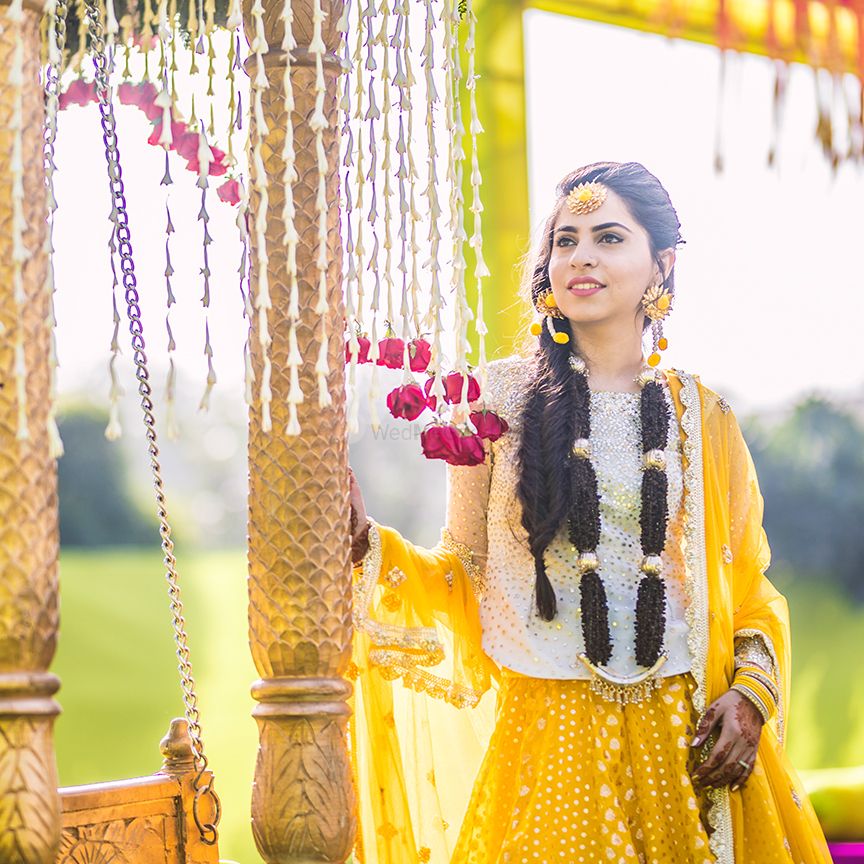 Photo of Mehendi or haldi bridal look in yellow