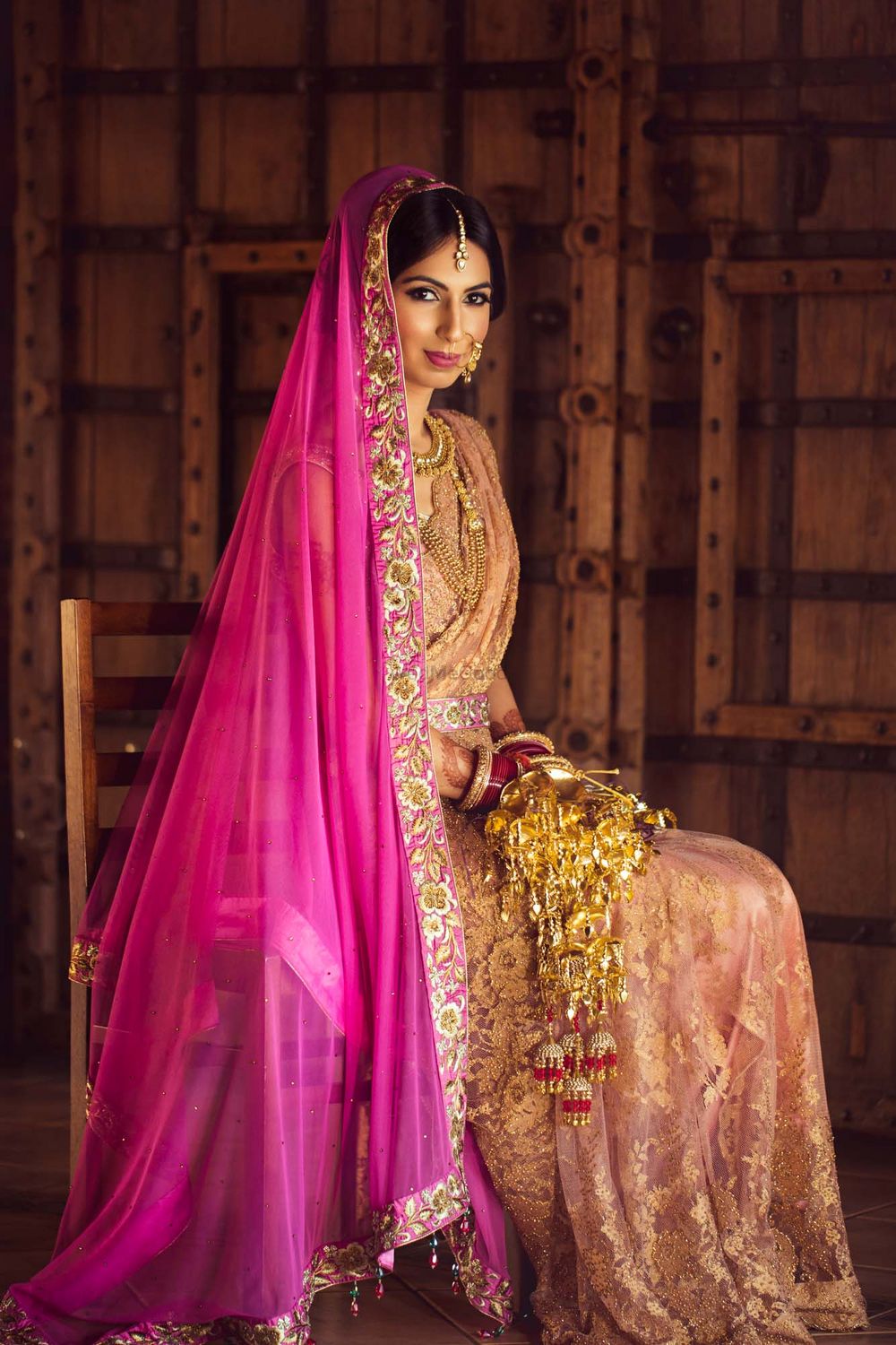 Photo of Unique bridal look with contrasting dupatta