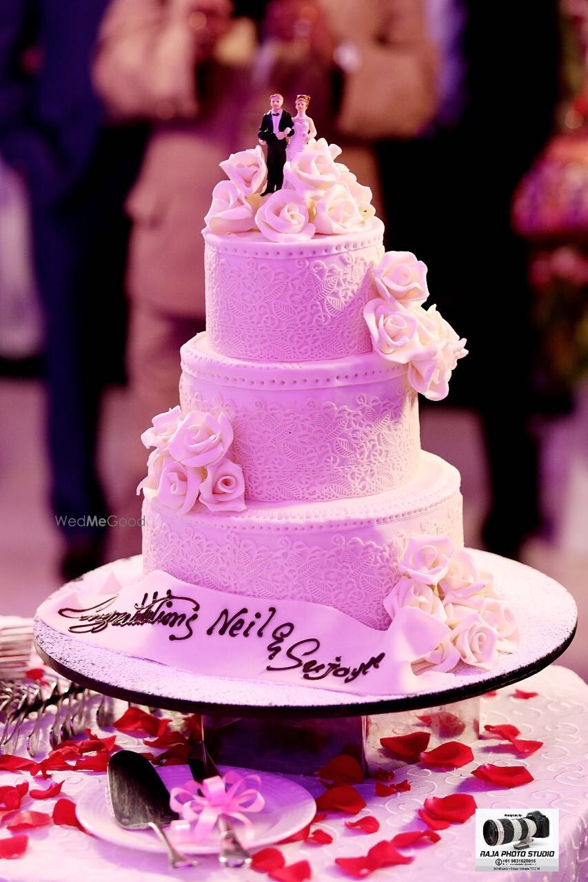 Photo of three tier wedding cake