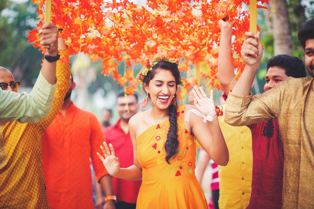 Photo of Orange phoolon ki chadar with bride under it
