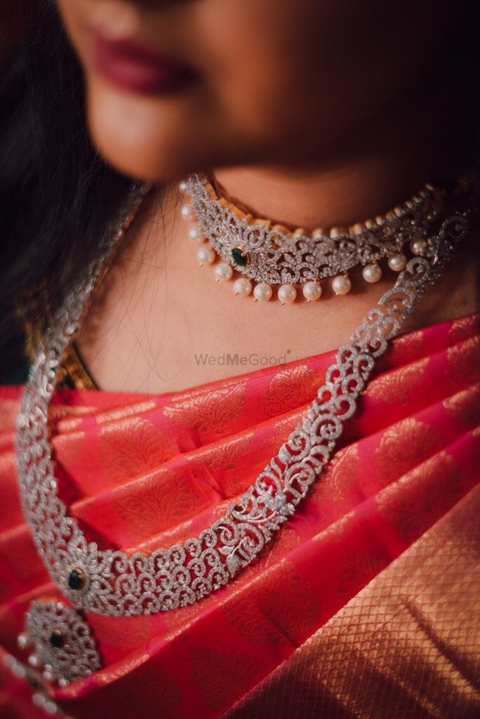 Photo of A diamond studded choker paired with a matching diamond rani haar.