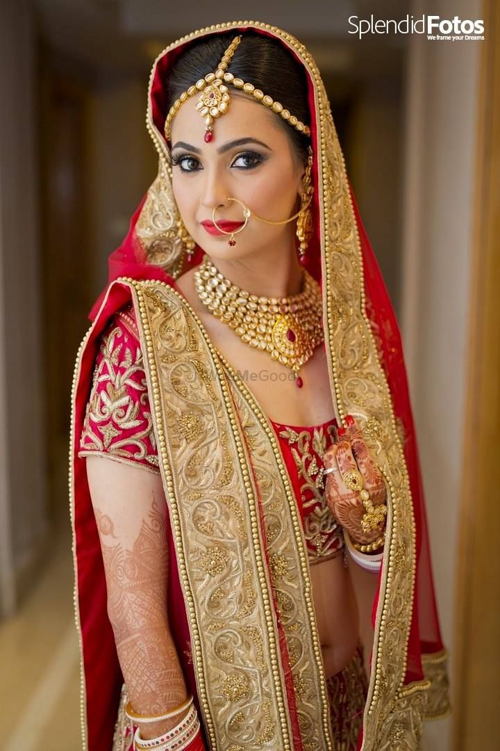 Photo of Gold Kundan Bridal Jewellery with Red Stones