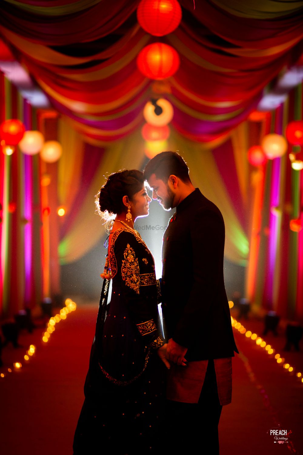 Photo of Romantic Portrait of Couple in Black at Entrance