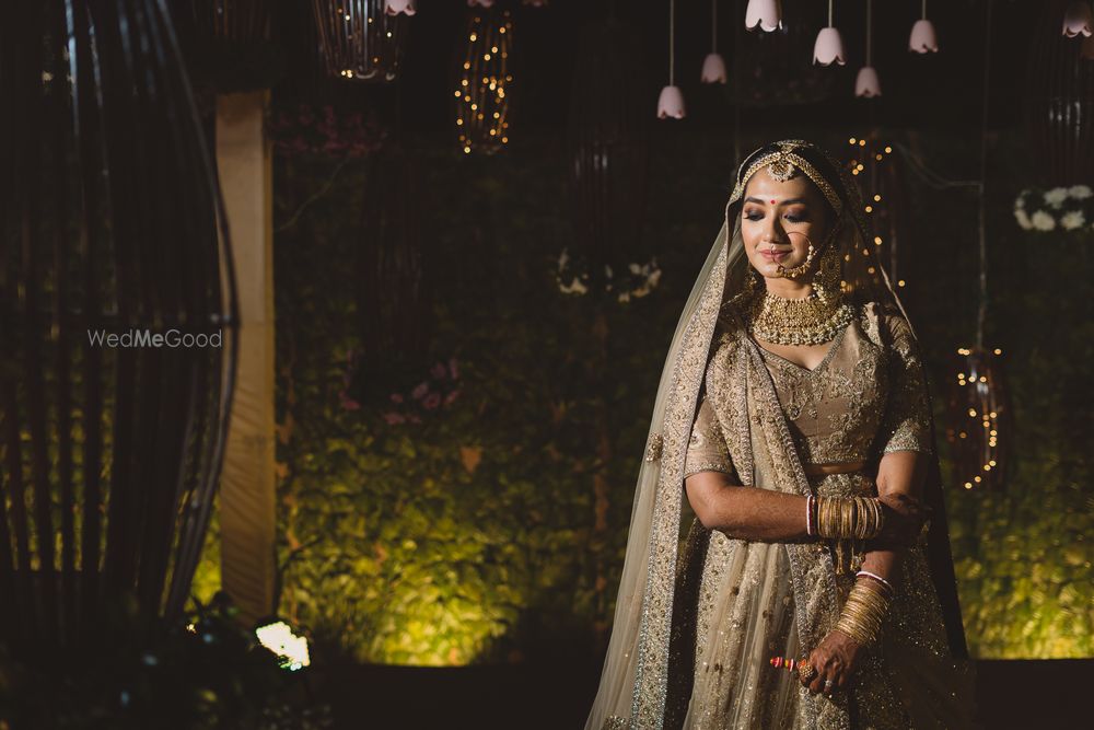 Photo of Beautiful shot of a bride in golden lehenga.