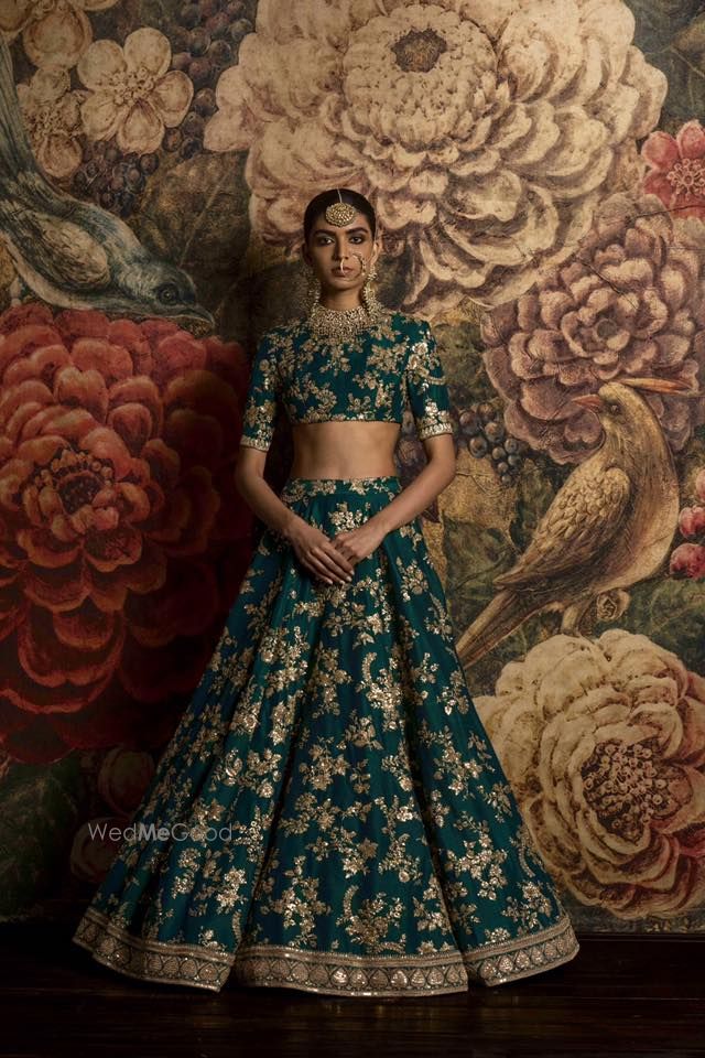 Photo of Green and gold lehenga