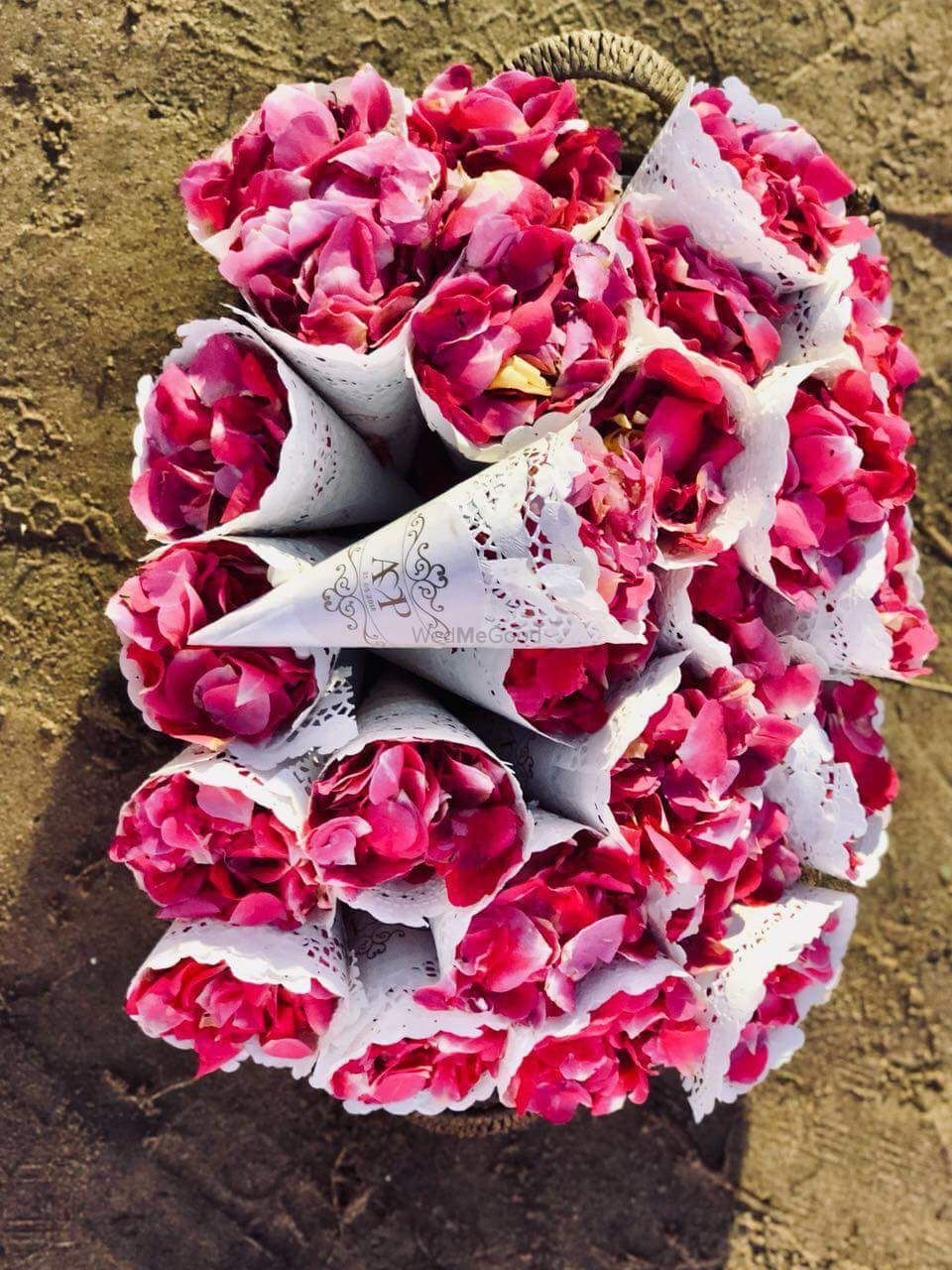 Photo of Paper cones filled with flower petals for flower shower