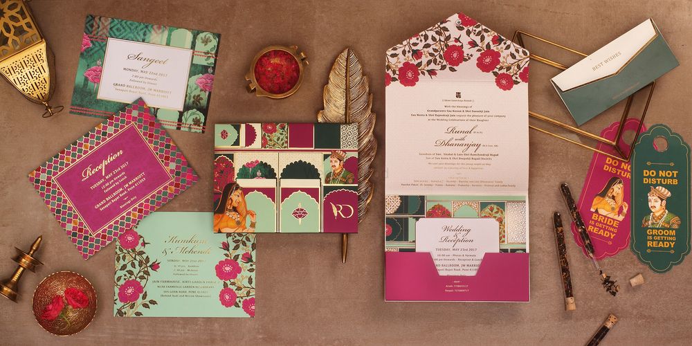 Photo of Modern Mughal theme destination wedding card