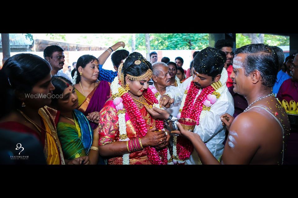 Photo By Thathrupam Wedding Stories - Photographers