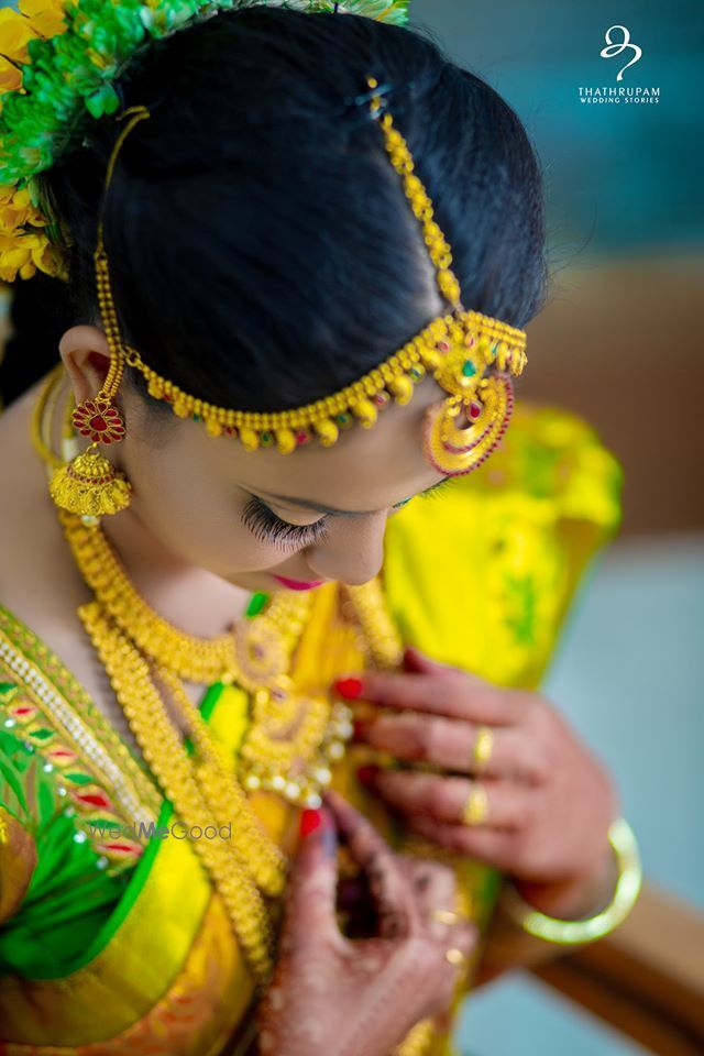 Photo By Thathrupam Wedding Stories - Photographers