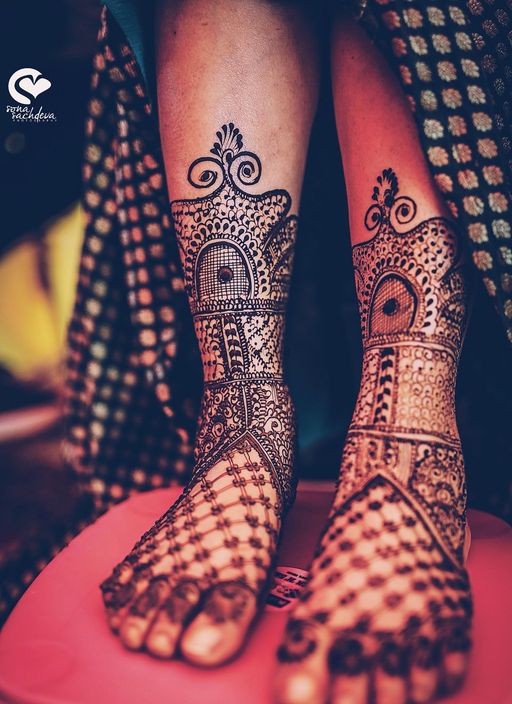 Photo of Unique bridal feet mehendi with jali design