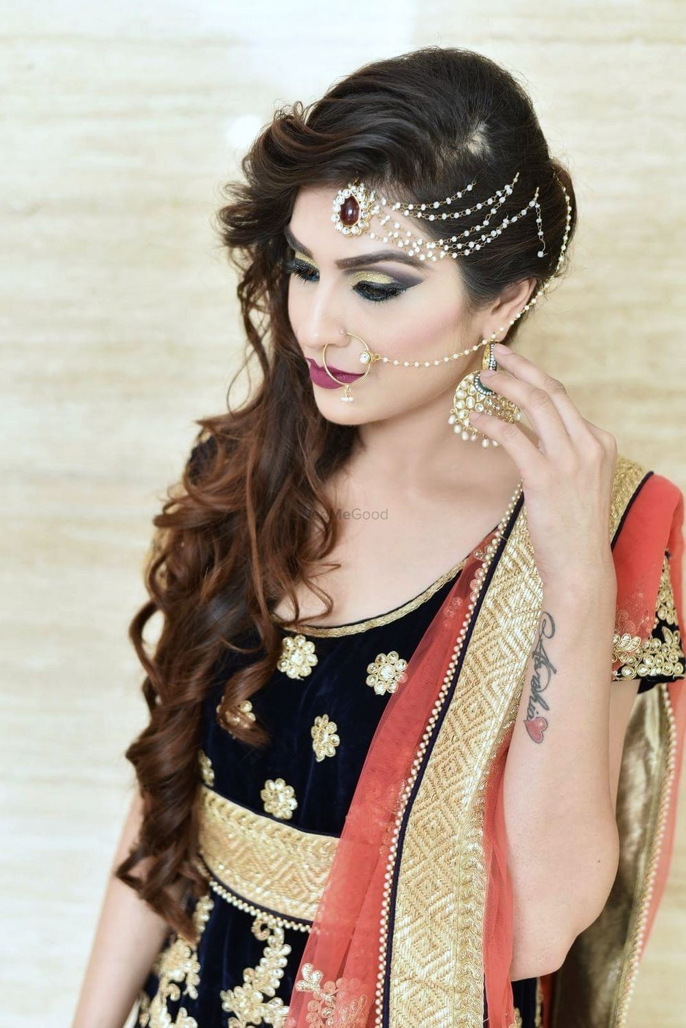 Photo of Pearl side mathapatti with matching nath and earrings