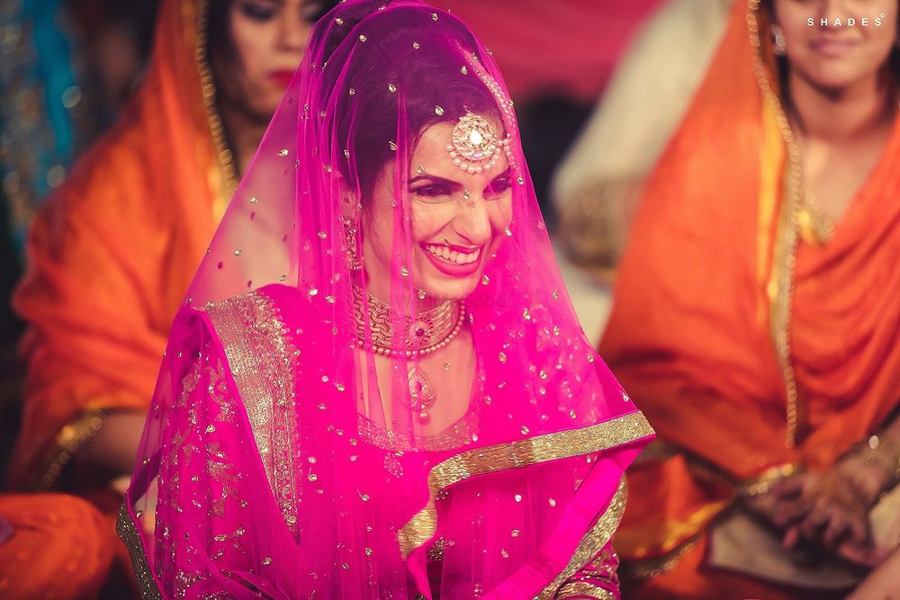 Photo of Sikh Bride with Bright Pink Veil