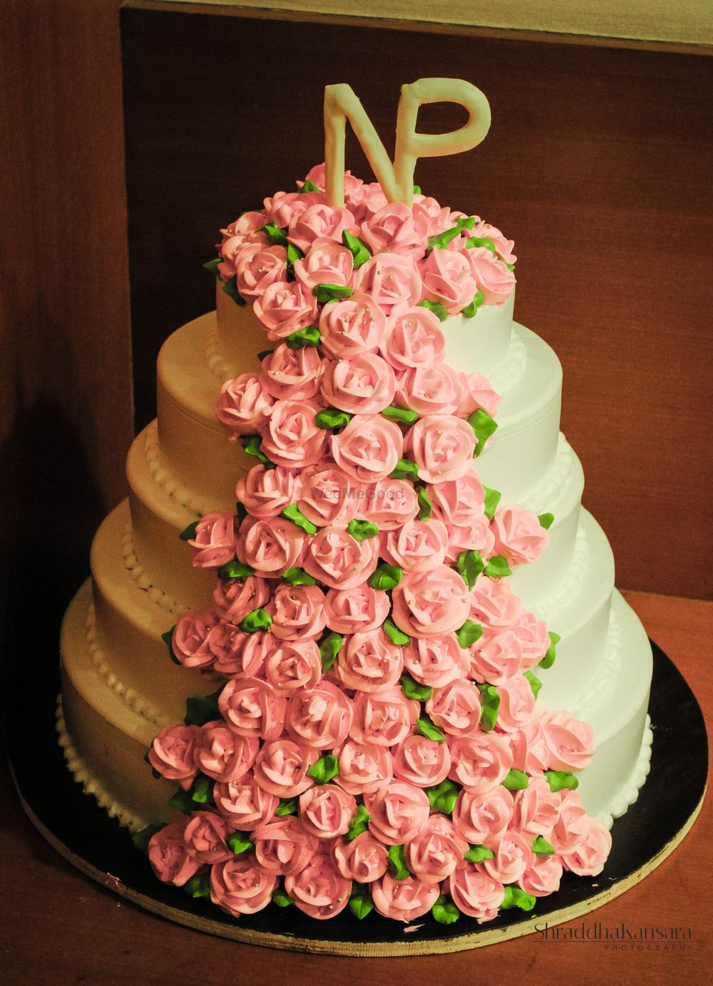 Photo of 5 Tiered White Cake with Pink Roses and Monograms