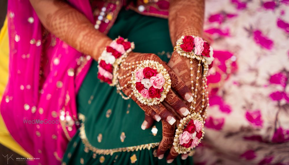 Photo of mehendi jewellery light and dark pink floral haathphool