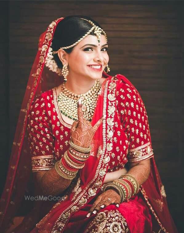 Photo of Cool bridal portrait with bride in red