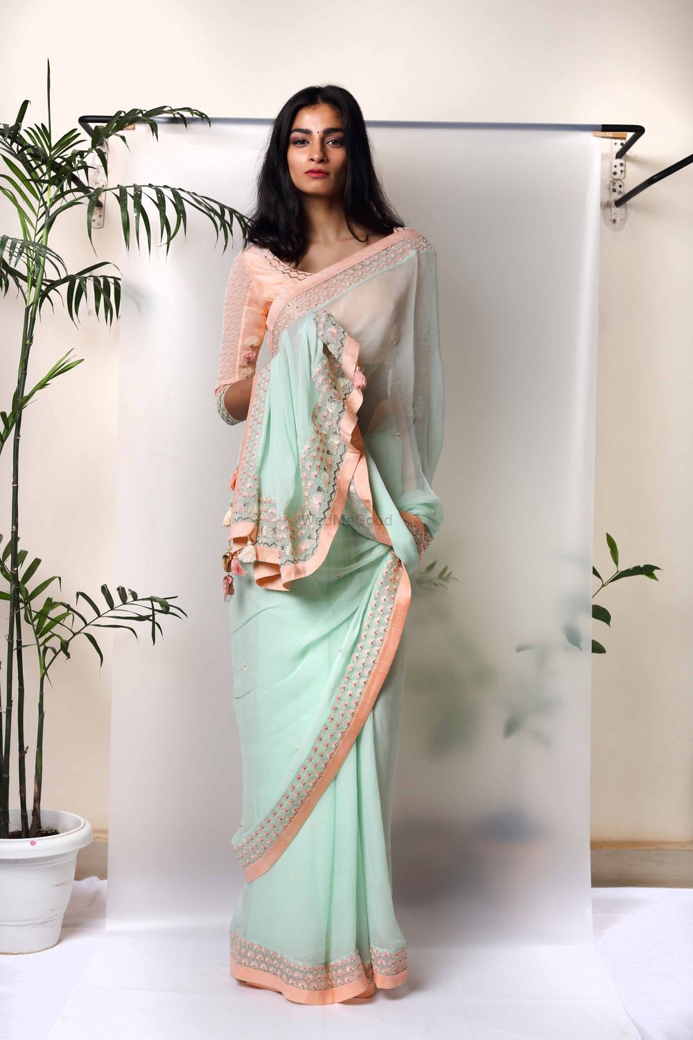 Photo of peach and pale blue saree