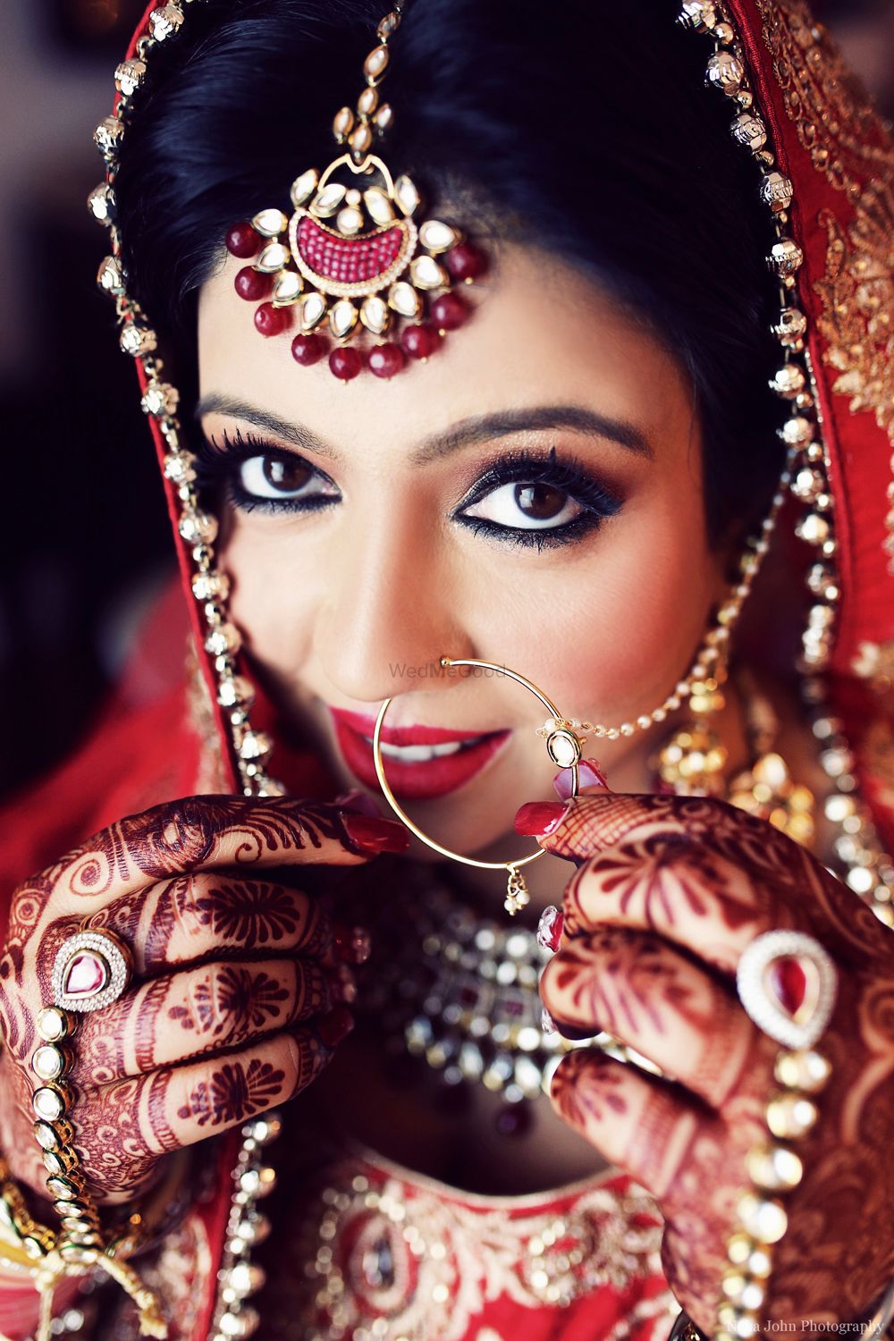 Photo of Deep Red Bridal Jewellery with Red Lehenga