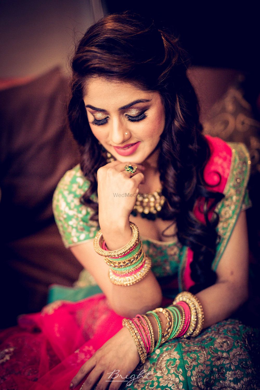Photo of Engagement bridal look with green and pink lehenga