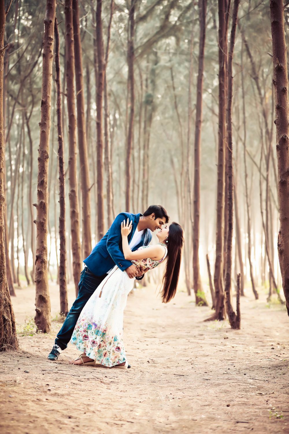 Photo of Romantic pre wedding shoot pose in forest