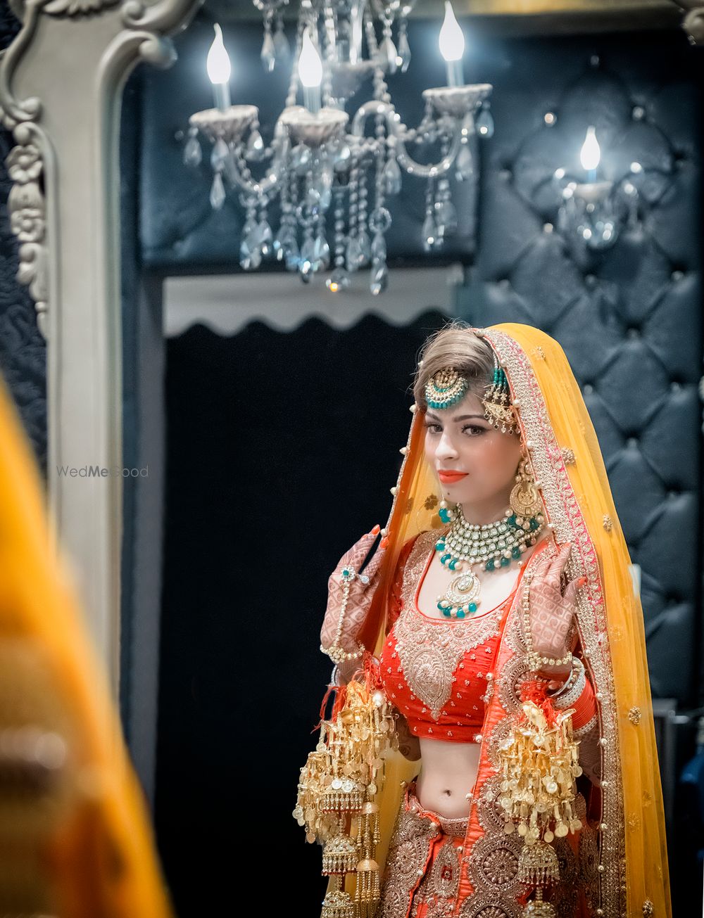 Photo of red yellow and orange bridal outfit