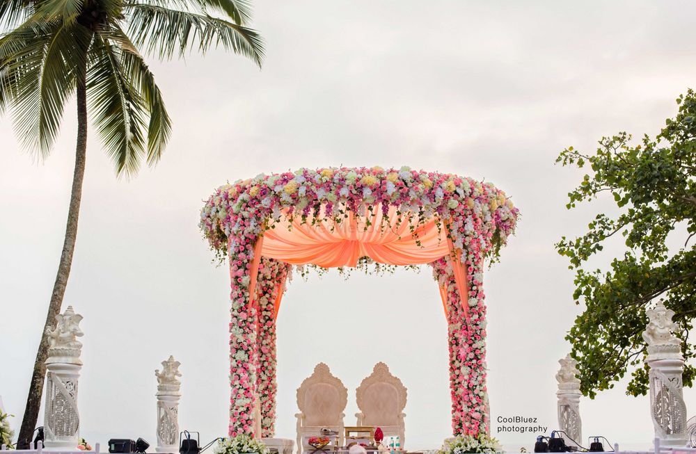 Photo of Floral mandap decor in pastel peach and pink