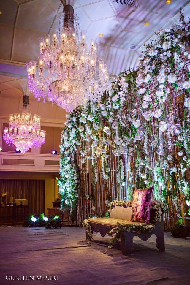 Photo of Floral Backdrops with Crystal Chandelier