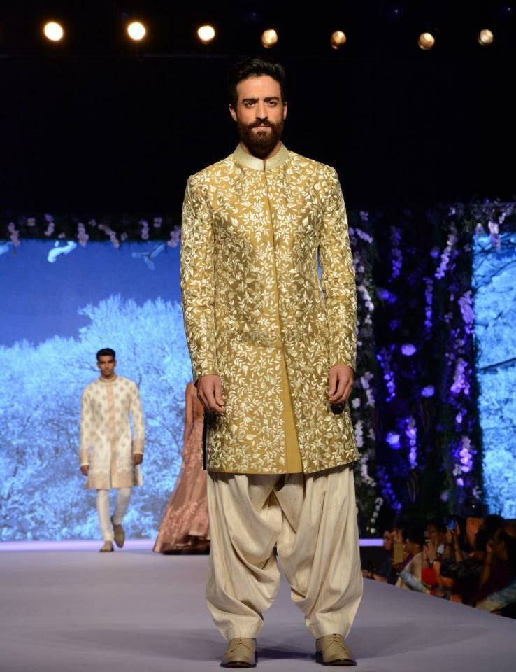 Photo of olive gold and green sherwani and dhoti