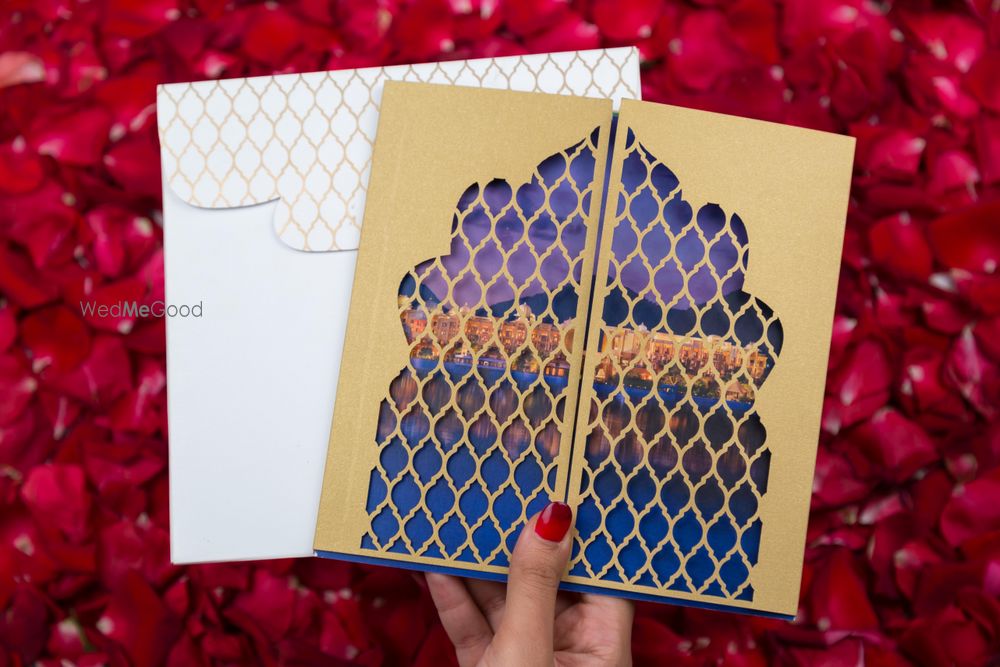 Photo of jaali cut invitation cards