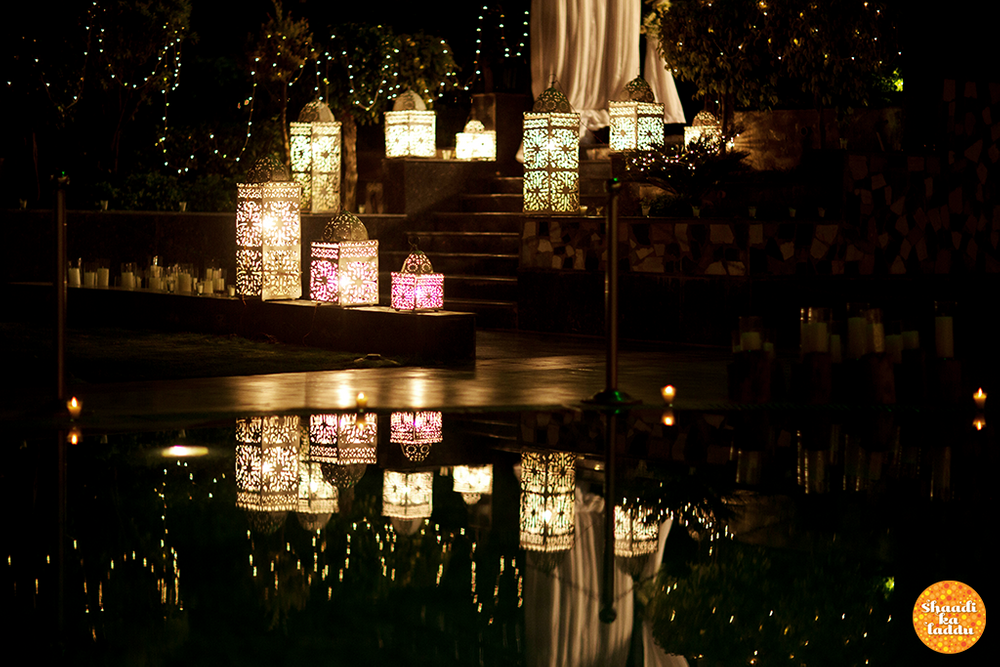 Photo of pool-side wedding decor
