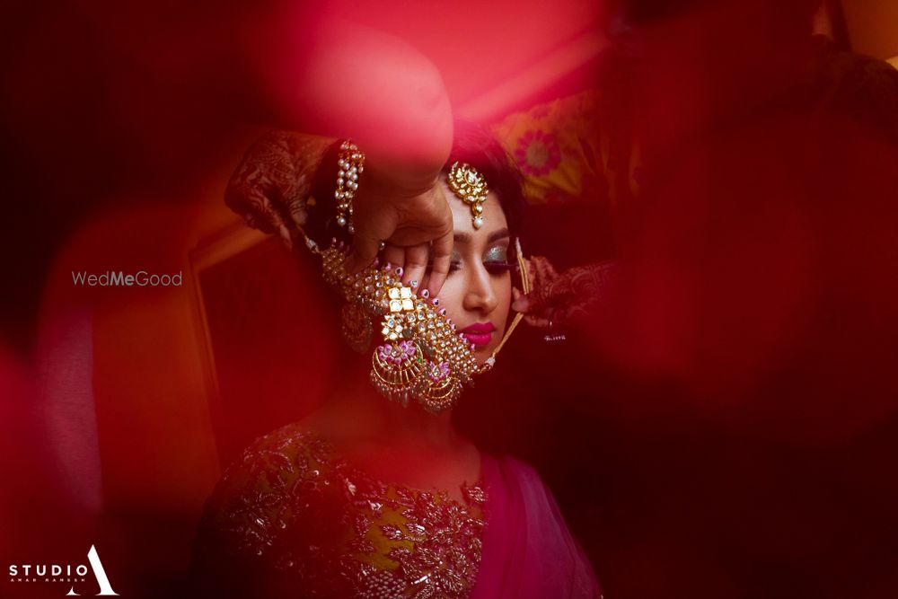 Photo of bride getting ready shot