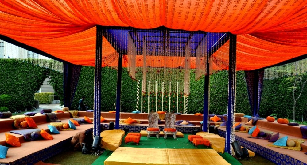 Photo of blue and orange mandap