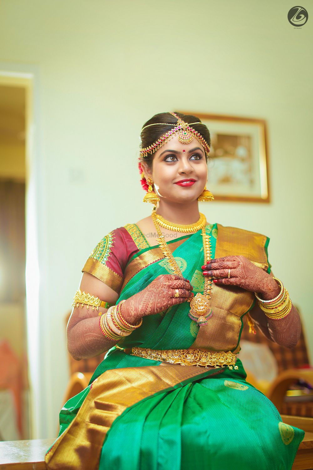 Photo of South indian bridal look in aqua and gold saree