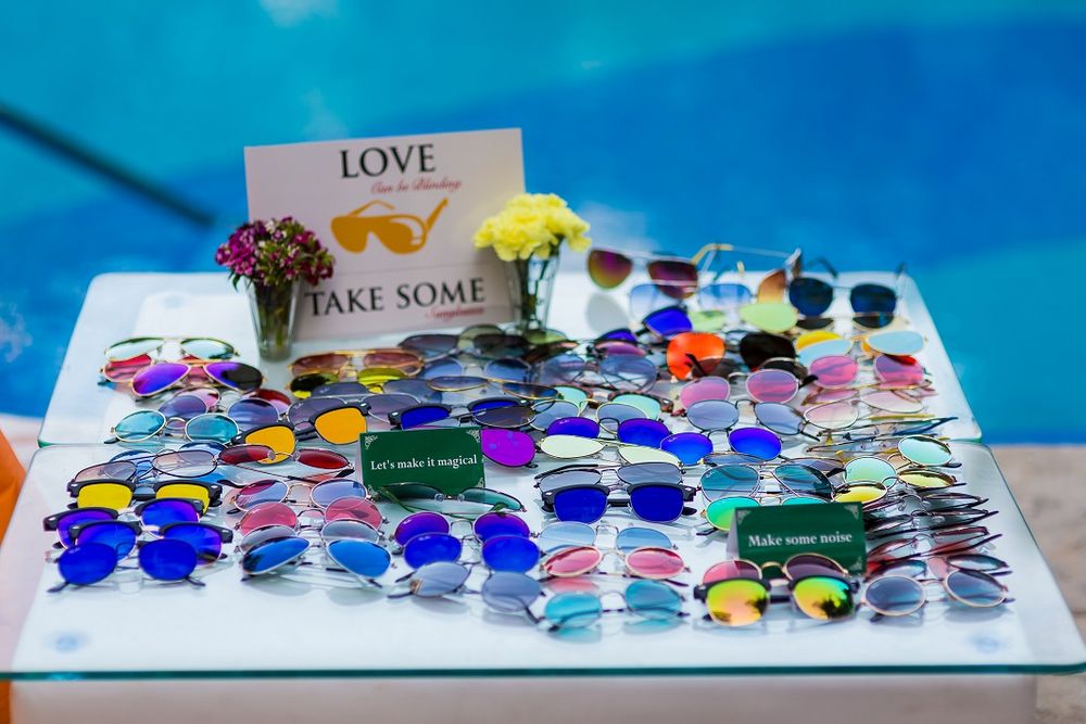 Photo of Sunglasses as favours for poolside mehendi