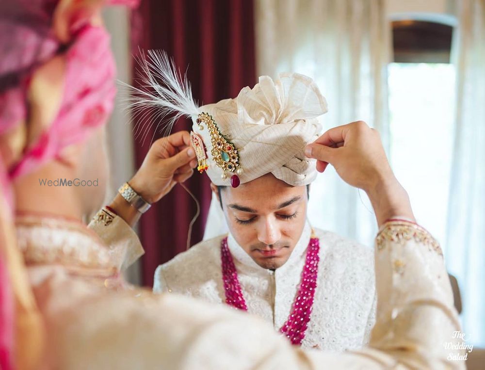 Photo of Groom getting ready shot.