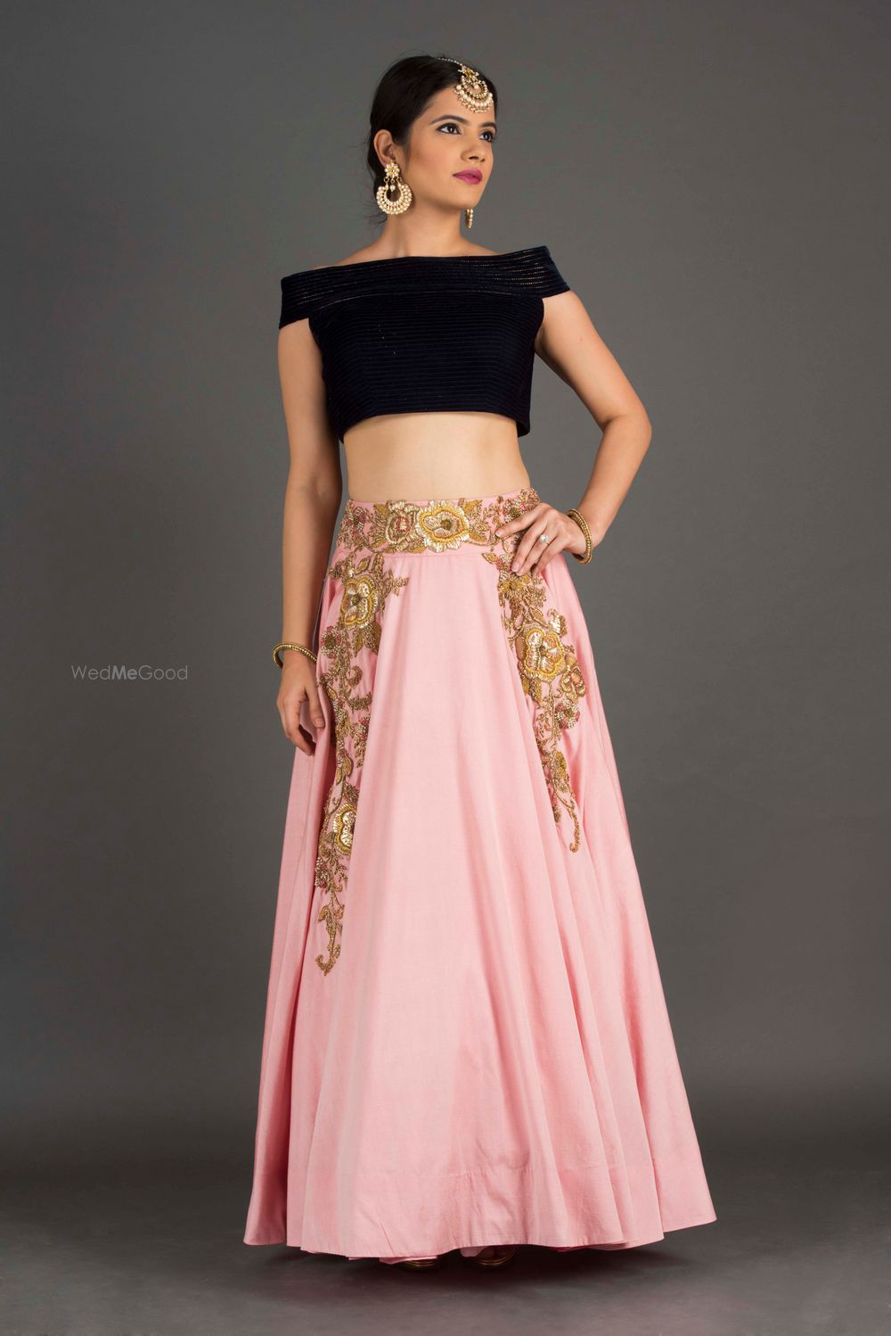 Photo of black and pink light lehenga