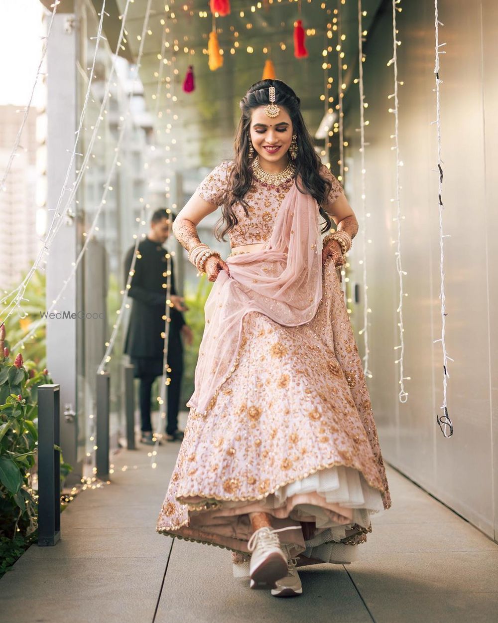 Photo of Bride showing off her shoes.