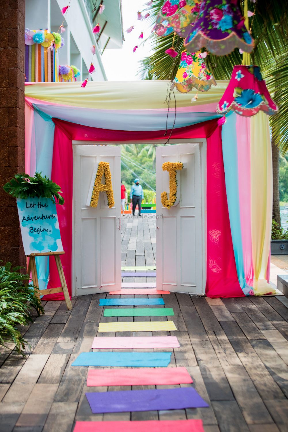 Photo of Colourful entrance decor with door and monograms