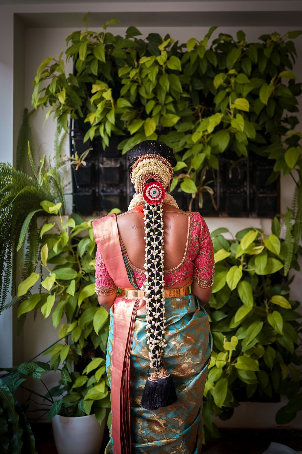 Photo of Mogra pool jada hairdo for south indian brides.