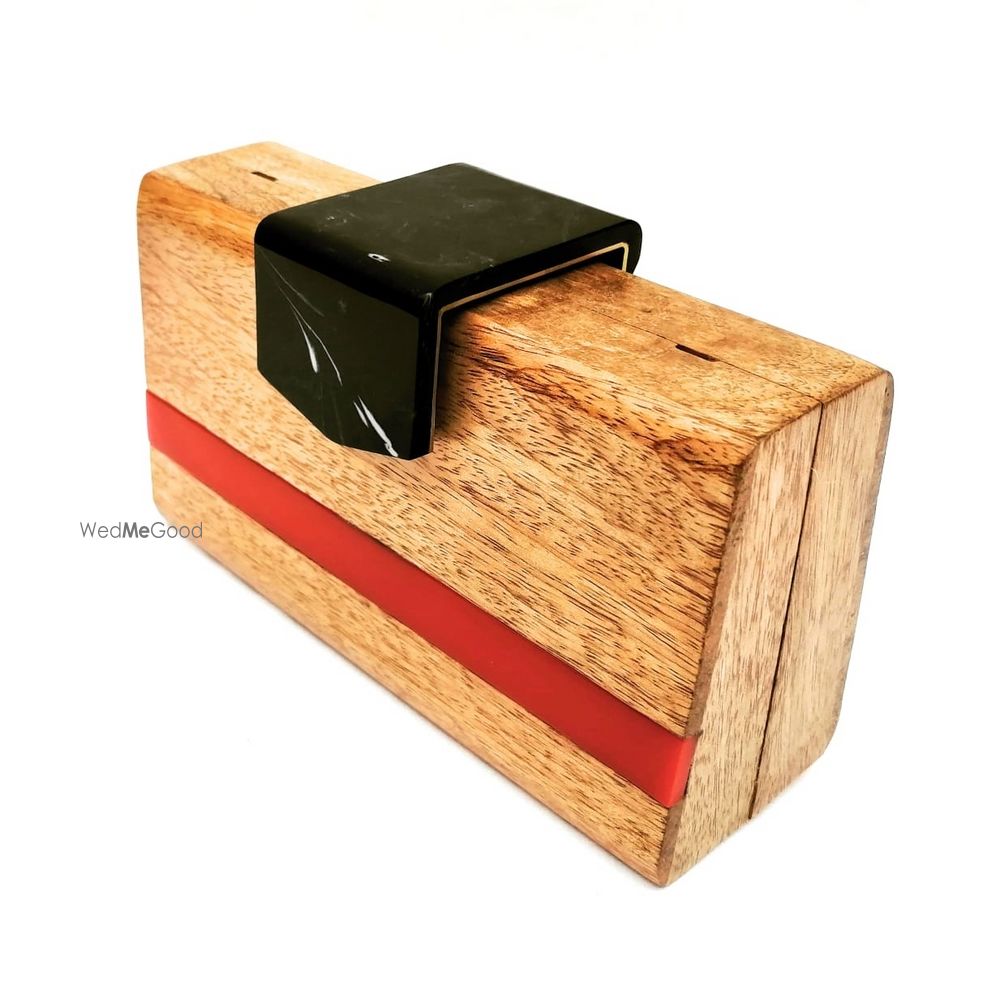 Photo From Wooden Clutches  - By Maziti Castle