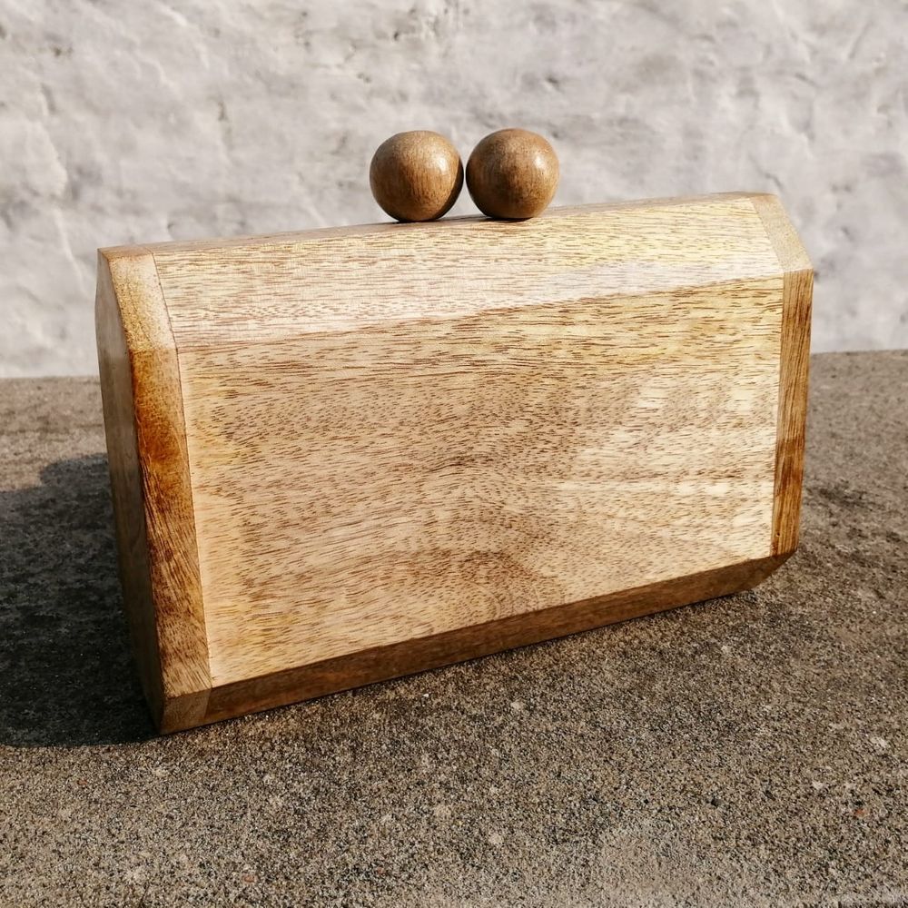 Photo From Wooden Clutches  - By Maziti Castle