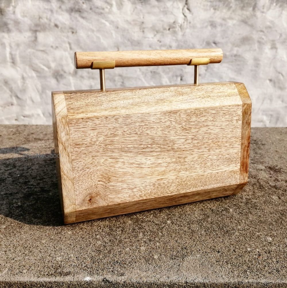 Photo From Wooden Clutches  - By Maziti Castle