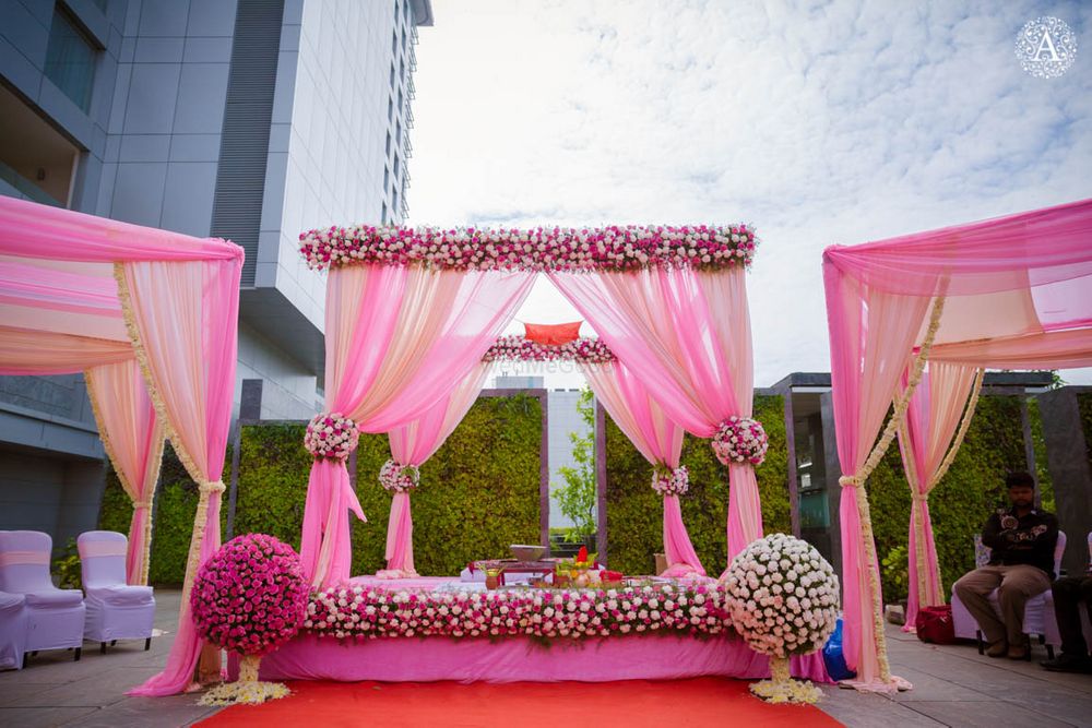 Photo of Light pink mandap with dreamy florals