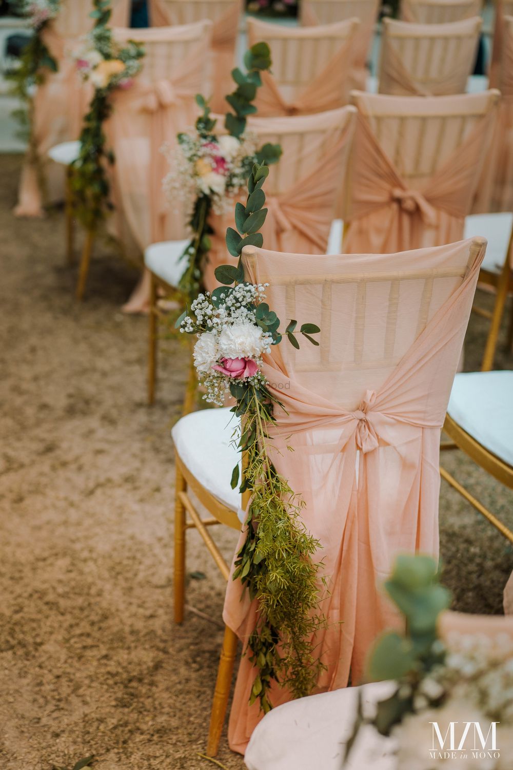 Photo of pretty floral decor idea with peach drapes