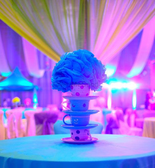 Photo of Teacup and saucer stack as centerpiece