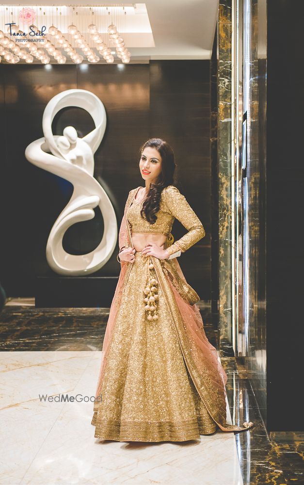 Photo of Golden bridal lehenga