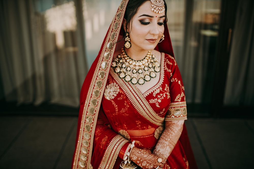 Photo of Bride in red lehenga