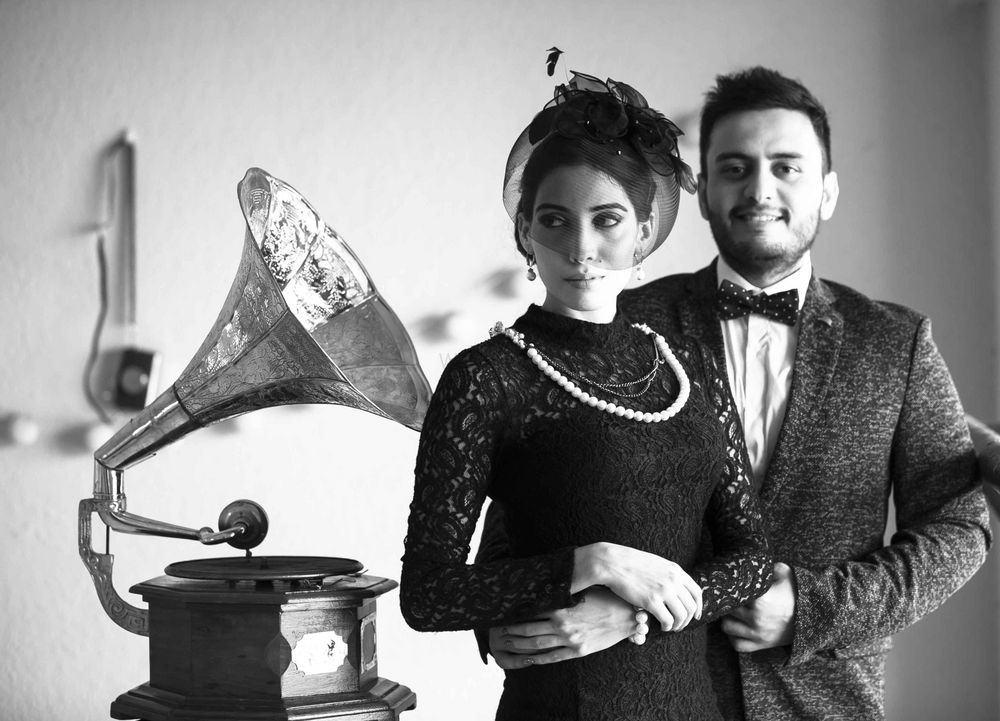 Photo of Vintage theme pre wedding with gramophone