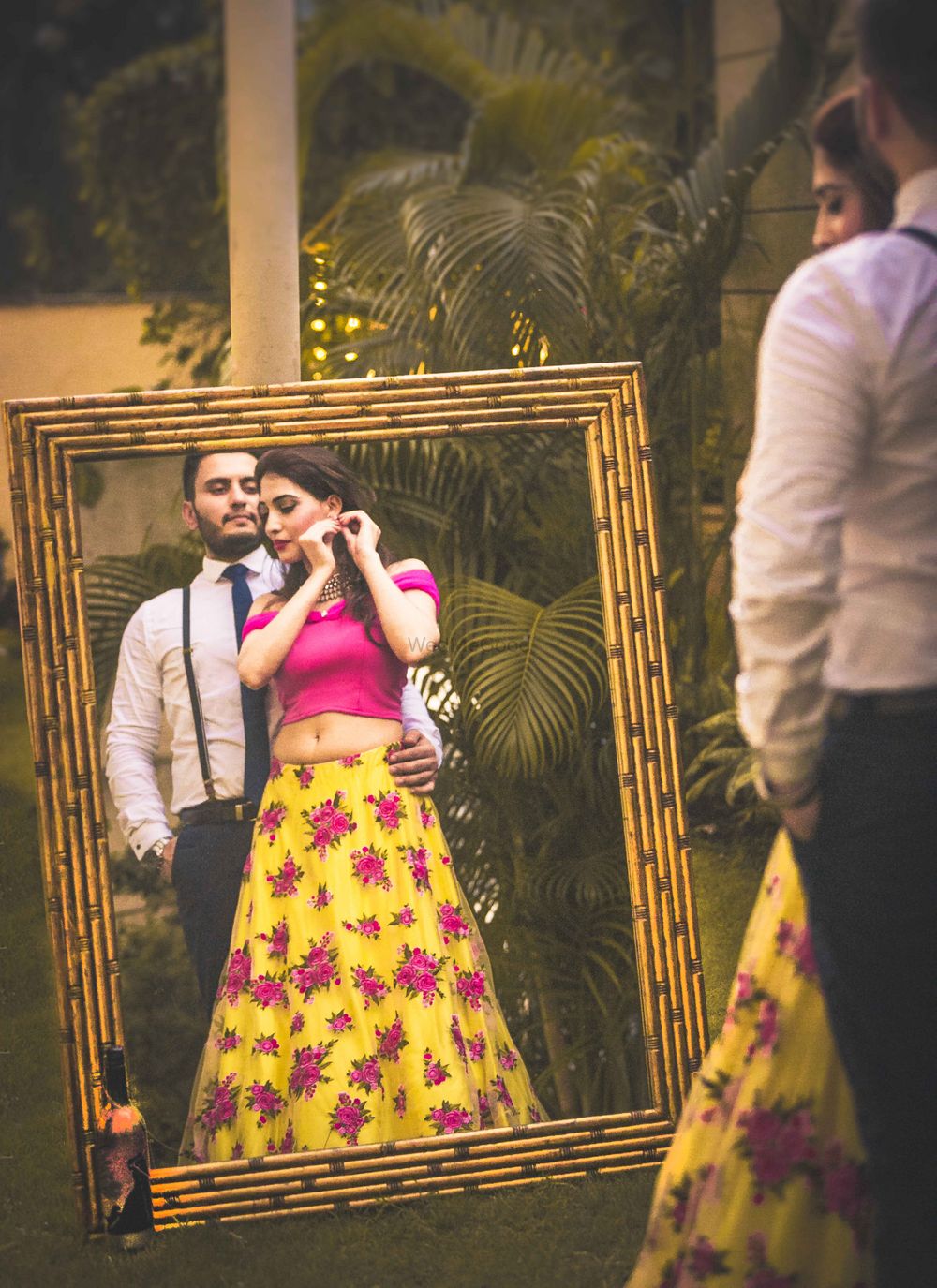 Photo of Pre wedding shoot with mirror and yellow floral lehenga
