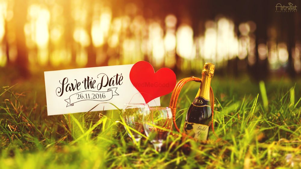 Photo of Save the date with champagne and a heart
