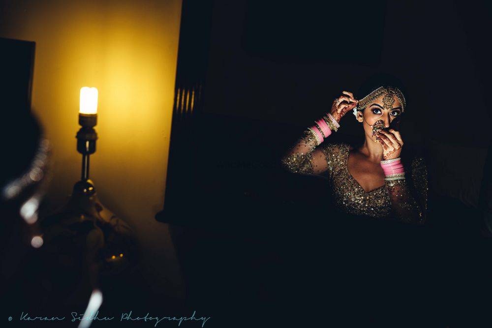 Photo of Bride getting ready wearing nath